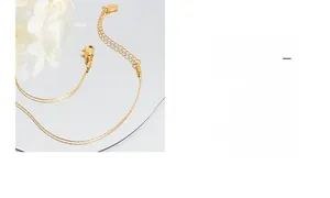 Detail of 18K gold-plated titanium steel necklace with lobster clasp and extension chain