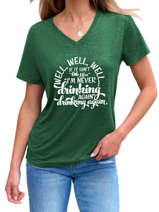 Close-up of Well Well Well letter print on a dark green V-neck slim fit T-shirt