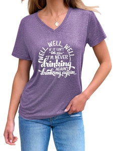 Detail of purple V-neck T-shirt with Well Well Well lettering and heather knit texture