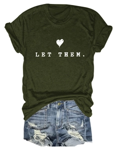 Olive green crew neck T-shirt with 'LET THEM.' print paired with ripped denim shorts