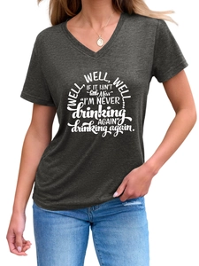 Detail of V-neck cotton T-shirt featuring 'well well well' slogan graphic print
