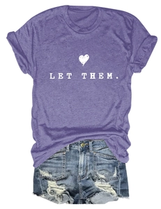 Flat lay of purple cotton T-shirt with LET THEM heart print and distressed denim shorts