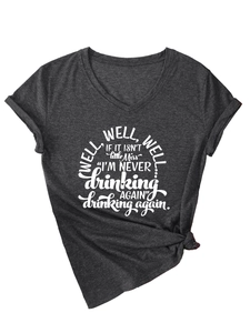 Detail of dark grey V-neck T-shirt showing rolled sleeves and side-knotted hem design