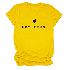 Detail of soft yellow cotton T-shirt featuring LET THEM text and hand-drawn heart print