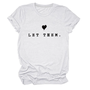 Close-up of white cotton T-shirt featuring LET THEM text and heart graphic print