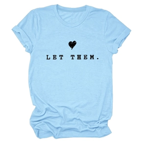 Detail of light blue t-shirt featuring LET THEM text and black heart print design
