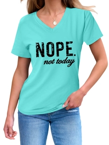 Detailed view of the V-neck and black NOPE not today slogan print on blue cotton T-shirt