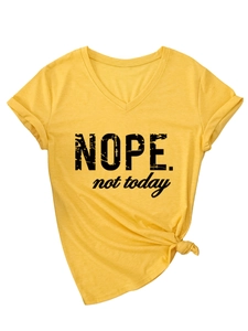 Detail of yellow V-neck T-shirt showing Nope Not Today print and side knot design