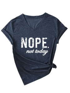 Detail of dark grey V-neck T-shirt featuring NOPE not today print and knotted hem detail