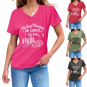 Detail of V-neck short sleeve T-shirt showing multi-color camping prints and soft fabric