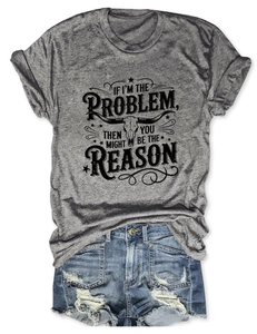Detail of grey graphic t-shirt with cattle skull print and distressed blue denim shorts