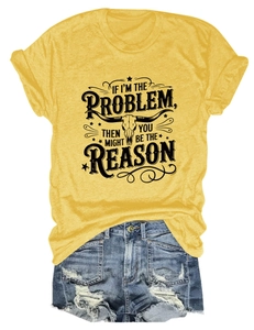 Close-up of yellow t-shirt with bull skull print and distressed blue denim shorts