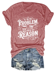 Flat lay of red graphic T-shirt with bull skull print and ripped denim shorts