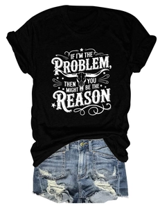 Close-up of distressed denim shorts with frayed edges and graphic t-shirt detail