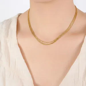 Elegant multi-layer 18K gold plated thin chain necklace featuring layered water-wave links
