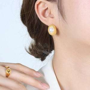 French vintage style C-shaped gold-plated titanium earrings with elegant faux pearls