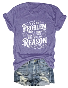 Close-up of purple t-shirt with skull graphic and distressed blue denim shorts detail