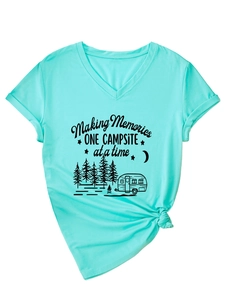 Close-up of V-neck campsite t-shirt featuring rolled sleeves and front hem knot detail