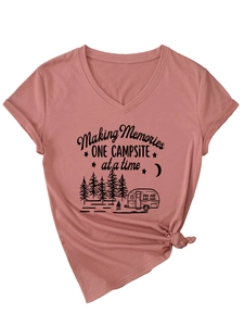 Detail of V-neck t-shirt in dusty pink featuring campfire and RV camping graphic print