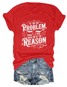 Flat lay of red T-shirt with bull skull print and distressed denim shorts outfit