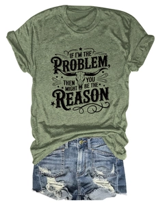 Flat lay of olive green graphic T-shirt with bull skull and distressed denim shorts