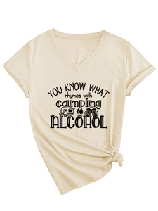 Detail of beige V-neck tee with camping quote and knotted hem design