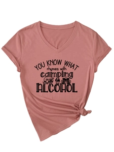 Detail of V-neck T-shirt in dusty rose featuring camping and alcohol graphic and side knot