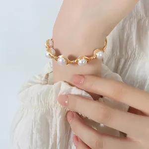 Handmade gold wire bracelet with baroque freshwater pearls in bohemian style