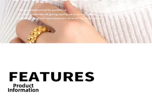 Close-up of golden gear-textured ring with industrial design on model finger