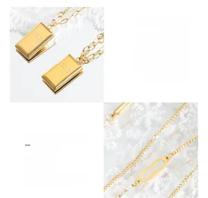 Detailed macro of 18K gold plated titanium steel necklace with square GOLD pendant