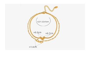 Détail de la chevillère dorée double couche avec pendentif cœur et love et ses mesures
