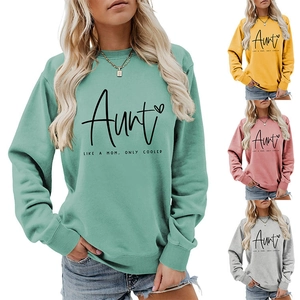 Detail showing the 'Aunt Like A Mom' print and the varied color options for women's sweatshirts