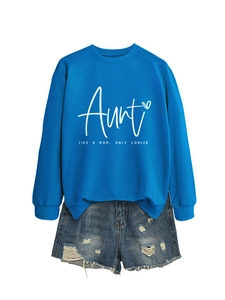 Detail of blue crewneck sweatshirt with Aunt Like a Mom text and heart graphic