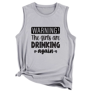 Close-up of light grey tank top with black slogan text and stylish side knot detail