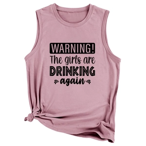 Detail of dusty rose tank top with Warning the Girls are Drinking slogan and side knot