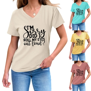 Detail view of Women's V-neck slogan T-shirt shown in beige, teal, mustard and pink