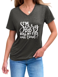 Detail of grey V-neck T-shirt with white I'M SORRY slogan and soft cotton texture