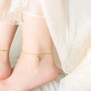 Minimalist gold anklet featuring a micro gold bar pendant with GOLD engraving for women