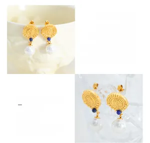 Detail view of French retro 18K gold-plated earrings with blue stone and pearl pendants