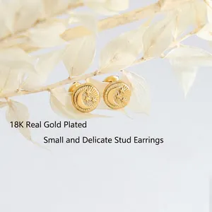 18K gold plated titanium steel stud earrings featuring embossed moon and star patterns