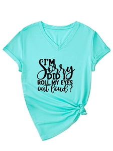 Detail of light blue V-neck t-shirt with knotted hem and funny slogan print