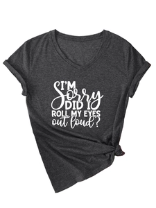 Detail view of the rolled sleeves and knotted hem on a V-neck slogan t-shirt