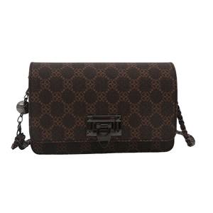 Retro coffee shoulder bag with clover pattern and metallic buckle on white background