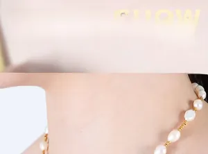 Detailed view of Baroque freshwater pearl necklace with 18K gold-plated spacer beads