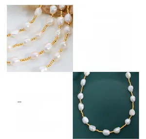 Detailed shot of 18K gold plated titanium steel chain with natural freshwater pearls