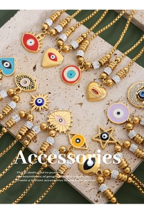 Detail of gold evil eye pendants with colorful enamel and micro-pave crystals on bead chains