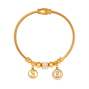 Gold wire cable bracelet with cubic zirconia butterfly heart pendants and infinity charms
