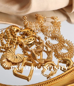 Collection of French style 18K gold plated titanium twisted and textured earrings