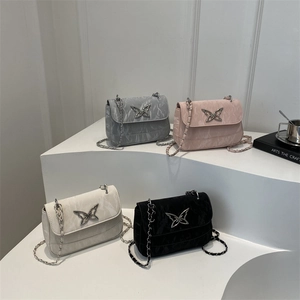 Minimalist crossbody bags with cloud texture and butterfly buckle in four elegant colors