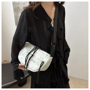 Detail of Chinese ink wash print crossbody bag with adjustable wide shoulder strap